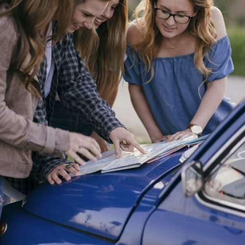 Tourists reading road map